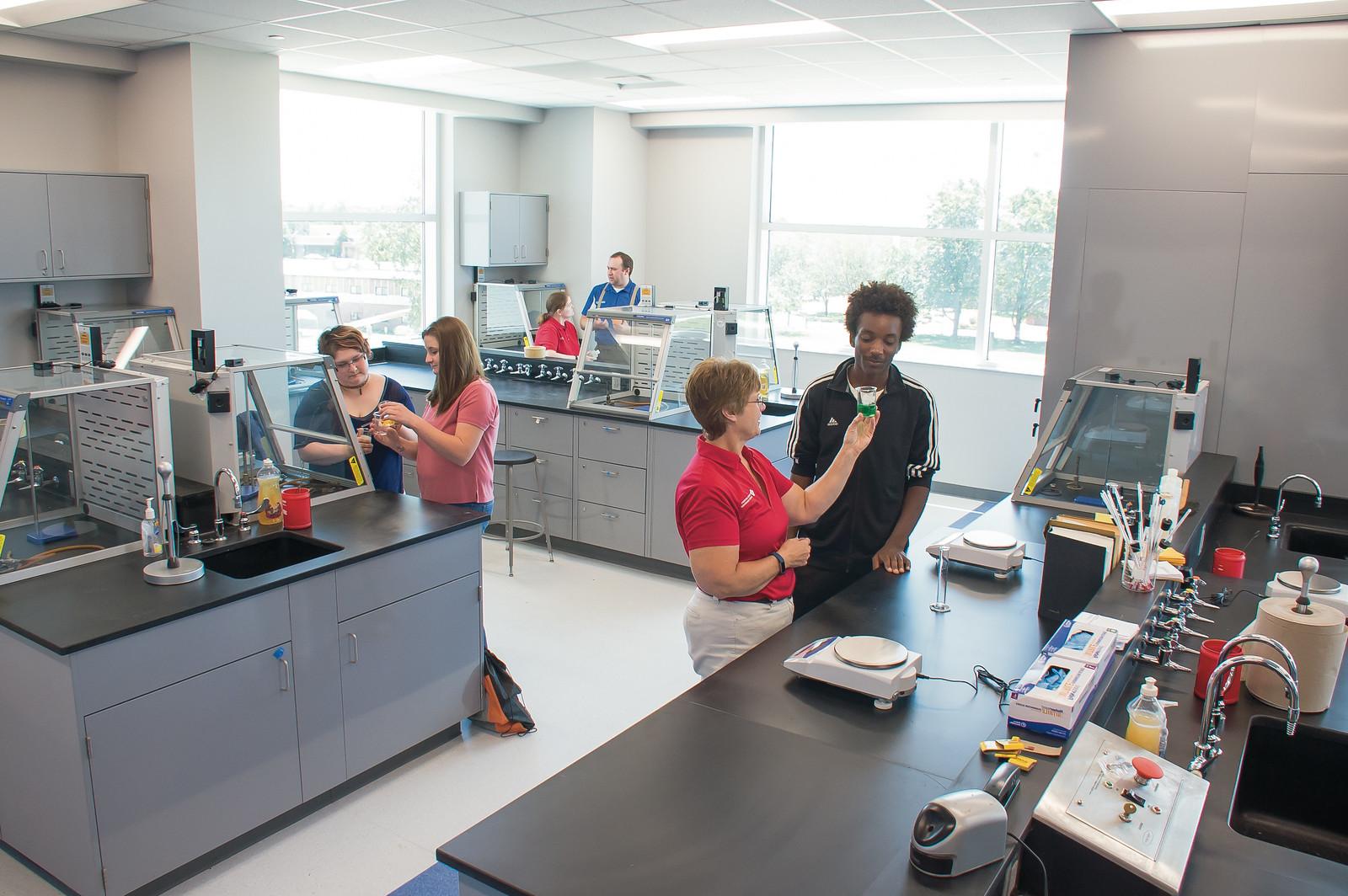 A chemistry class participating in a lab